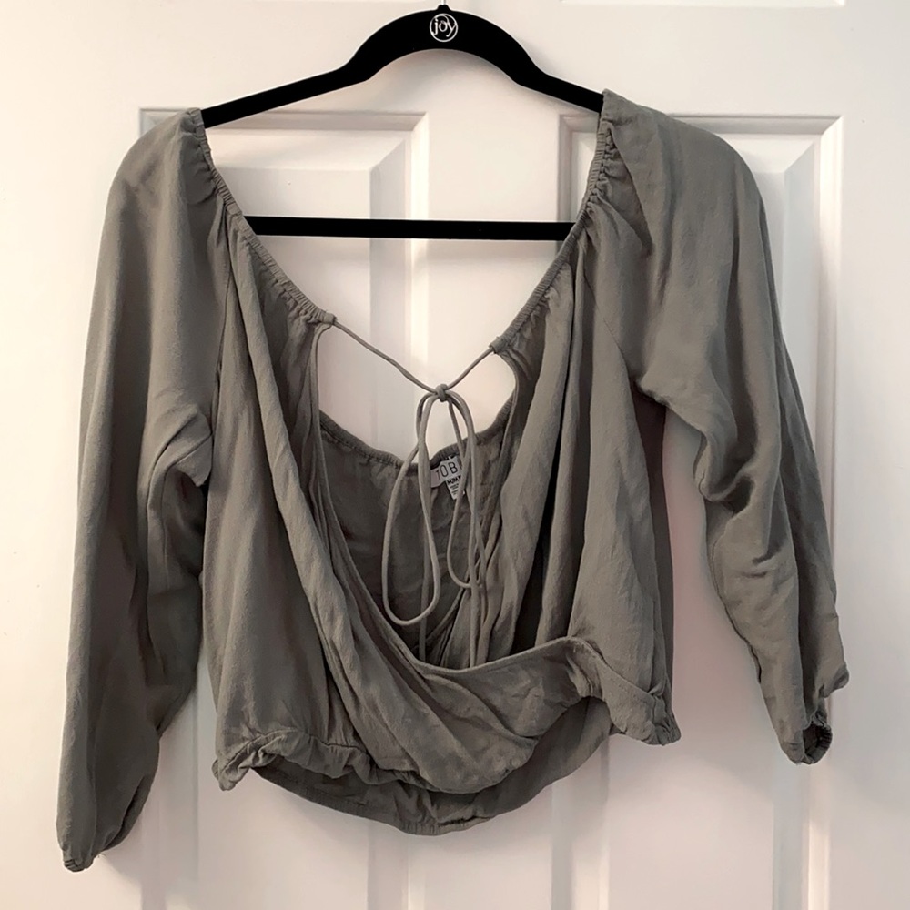 Open front- long sleeved- crop top.
